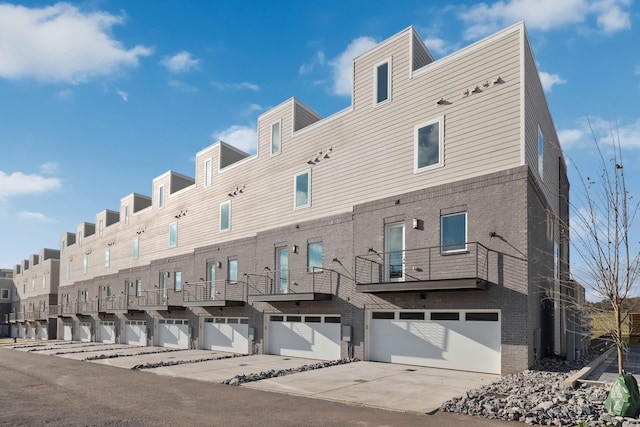 view of building exterior featuring a garage