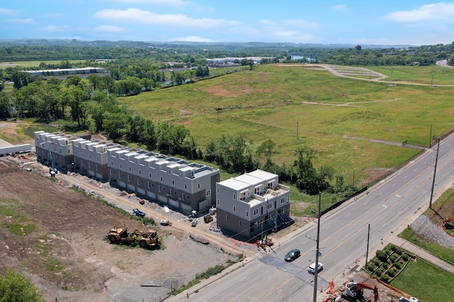 birds eye view of property featuring a rural view