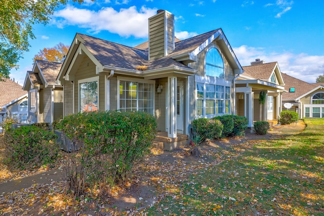 exterior space featuring a front lawn