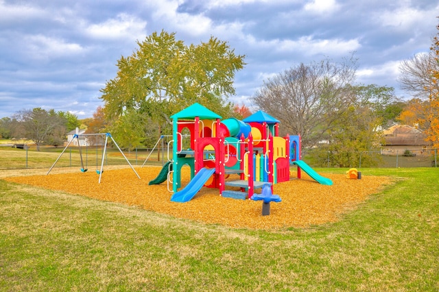 view of play area featuring a lawn