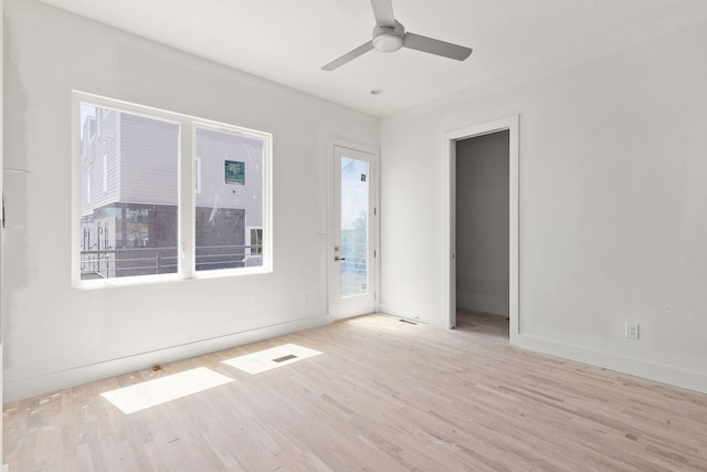 1016 W Trinity Ln Unit 18, Nashville, TN 37218 - spare room with wood finished floors, a ceiling fan, and baseboards