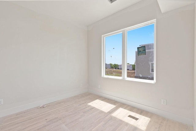 1016 W Trinity Ln Unit 18, Nashville, TN 37218 - unfurnished room featuring wood finished floors and baseboards