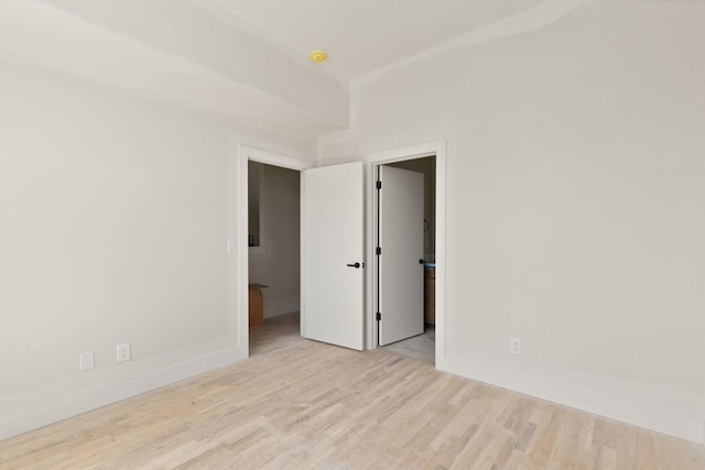 1016 W Trinity Ln Unit 18, Nashville, TN 37218 - unfurnished room with wood finished floors, baseboards, and a smoke detector