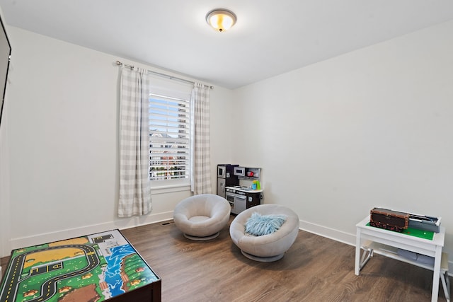 game room featuring hardwood / wood-style flooring