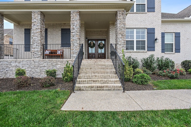 entrance to property featuring french doors