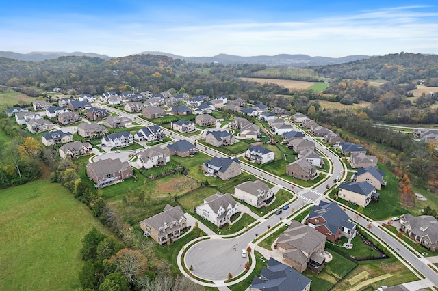 birds eye view of property featuring a mountain view