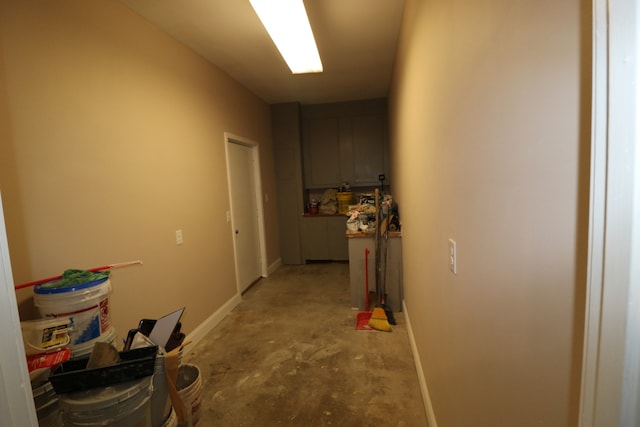 corridor featuring concrete flooring