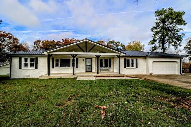 ranch-style home with a garage, a front lawn, and covered porch