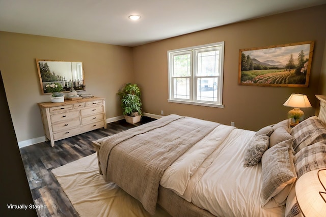 bedroom featuring dark hardwood / wood-style floors