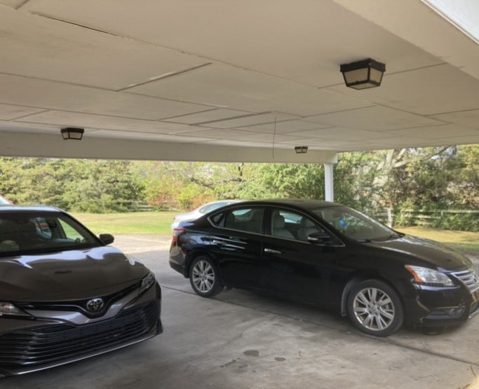 garage with a carport