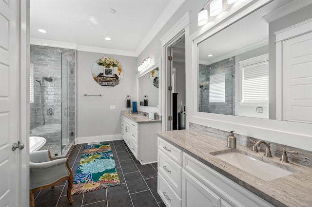 bathroom featuring ornamental molding, tile patterned flooring, vanity, and a shower with door