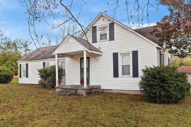 view of front of house with a front lawn