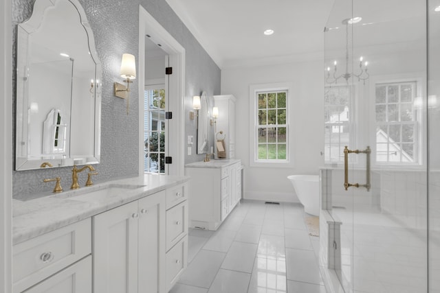 bathroom with vanity, plus walk in shower, a wealth of natural light, and tile patterned flooring