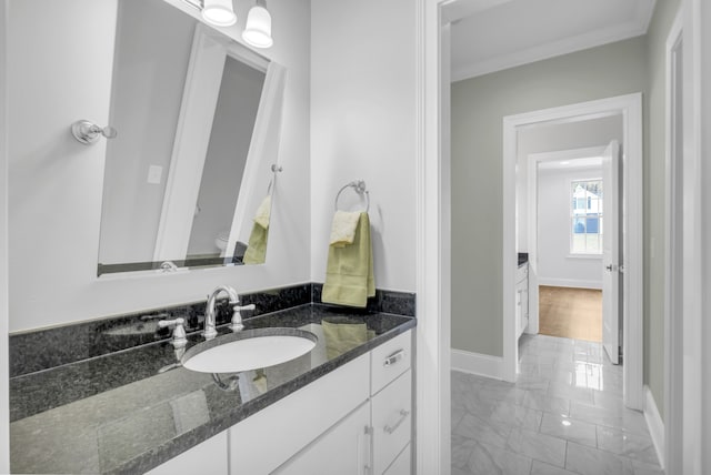 bathroom with toilet and vanity