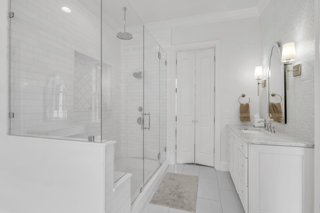 bathroom featuring vanity, walk in shower, tile patterned flooring, and ornamental molding