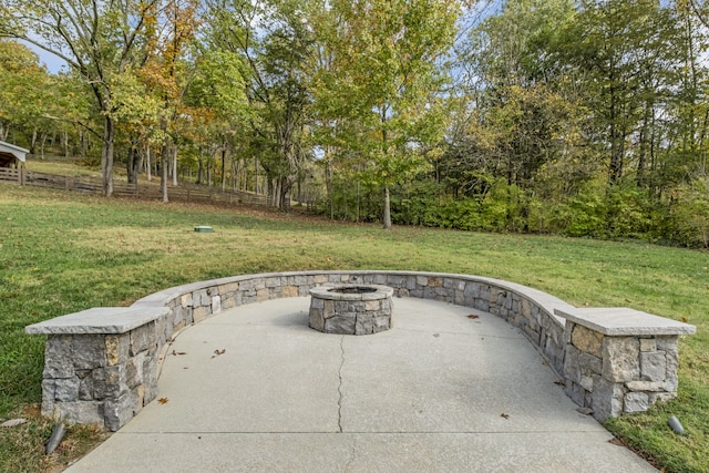 view of patio / terrace with a fire pit