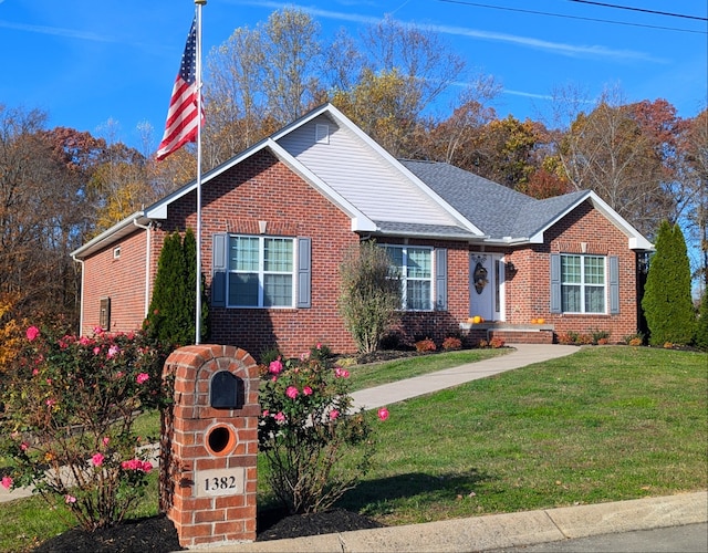 view of front facade with a front yard