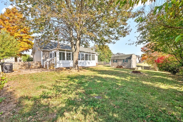 view of yard featuring a sunroom