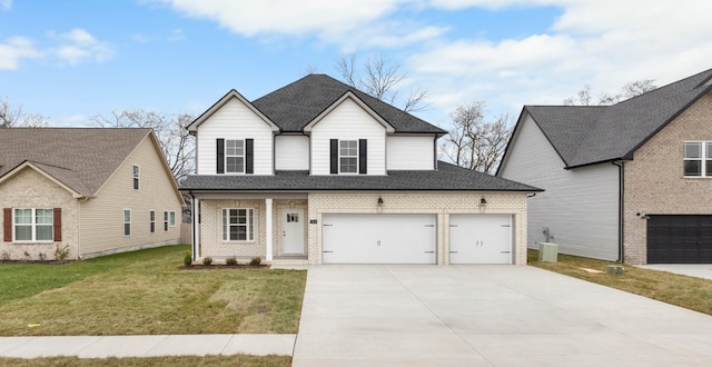 view of front of home featuring central AC, a garage, and a front lawn