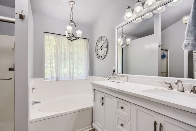 bathroom with a bathtub and vanity