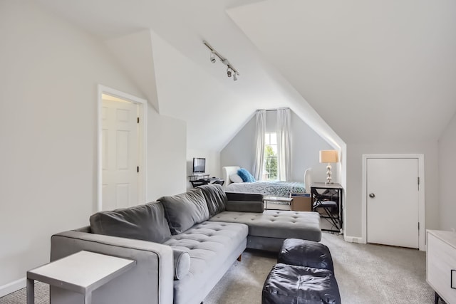 living room with lofted ceiling and light colored carpet