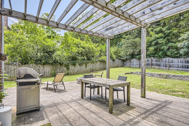 view of patio featuring grilling area and a pergola