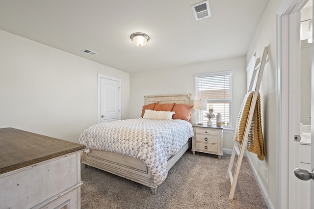 bedroom featuring dark carpet