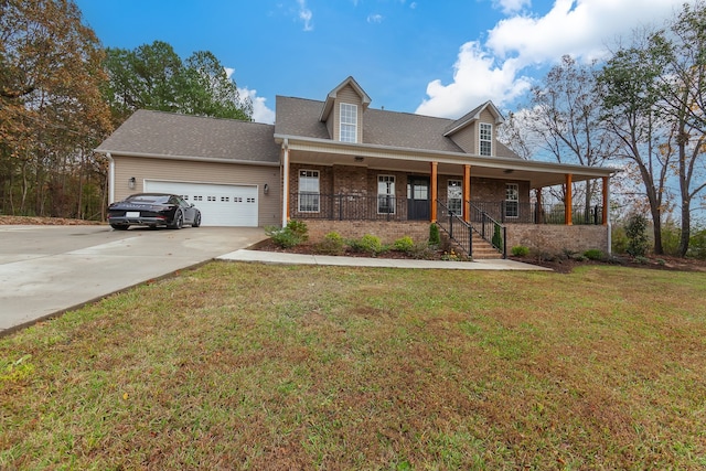 cape cod home with a garage, a front lawn, and covered porch