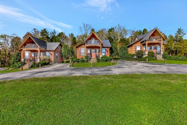 craftsman-style house with a front lawn and a porch