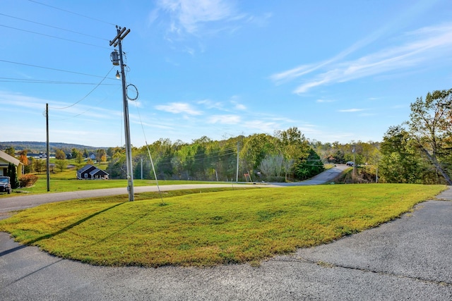 surrounding community featuring a lawn