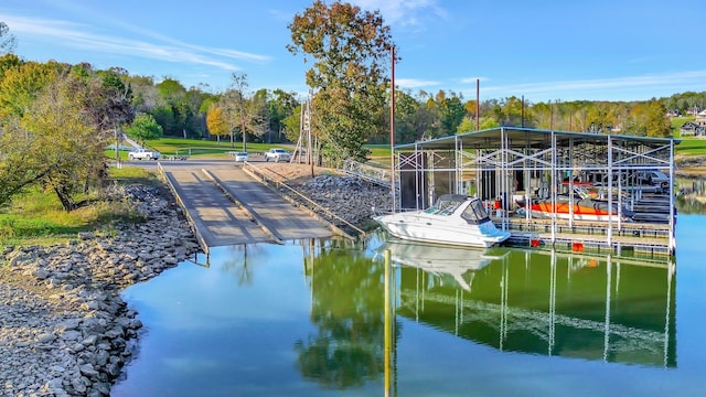 dock area featuring a water view