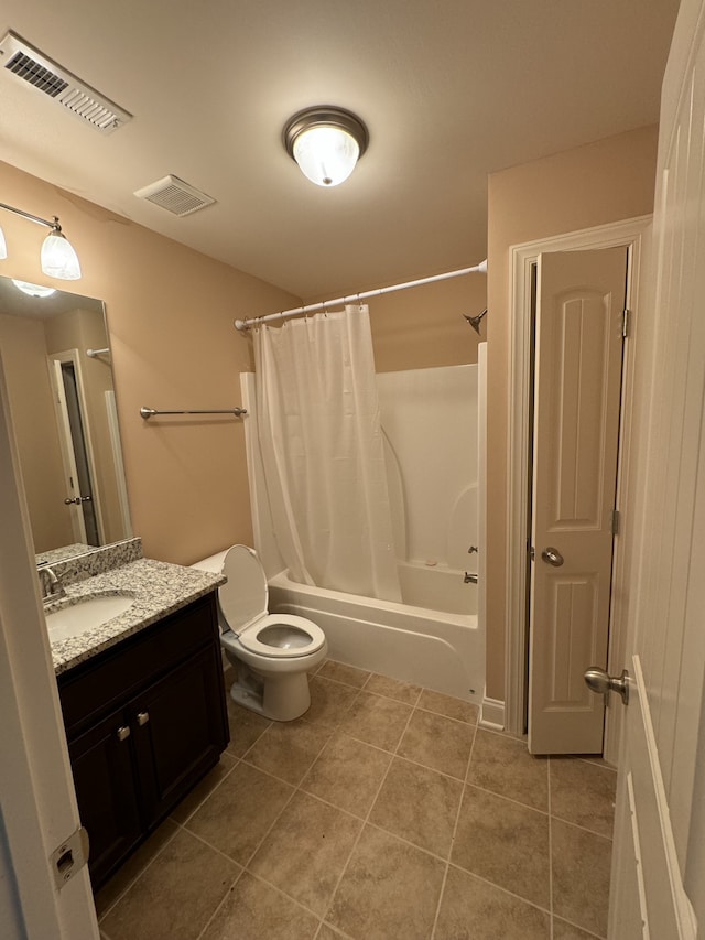 full bathroom with toilet, vanity, tile patterned floors, and shower / bath combo with shower curtain