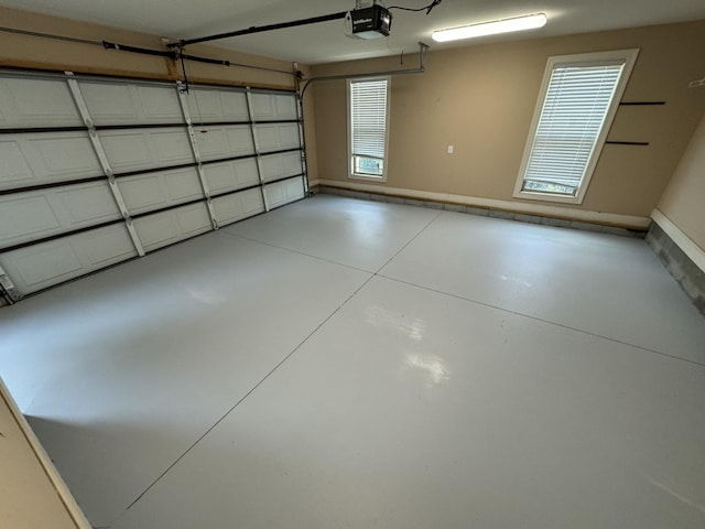 3213 Shady Forest Dr, Murfreesboro, TN 37128 - garage with a garage door opener and baseboards