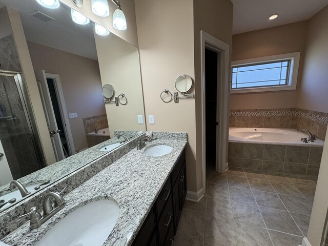 3213 Shady Forest Dr, Murfreesboro, TN 37128 - bathroom featuring a bath, double vanity, a shower stall, and tile patterned floors