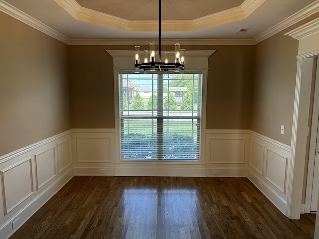 3213 Shady Forest Dr, Murfreesboro, TN 37128 - unfurnished dining area with a chandelier, a tray ceiling, dark wood finished floors, a wainscoted wall, and crown molding