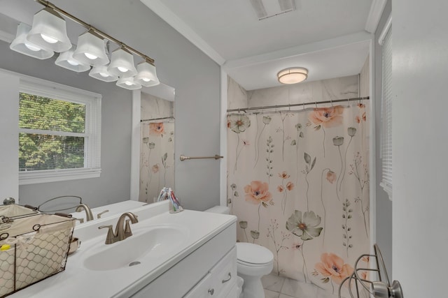 bathroom with vanity, toilet, and curtained shower