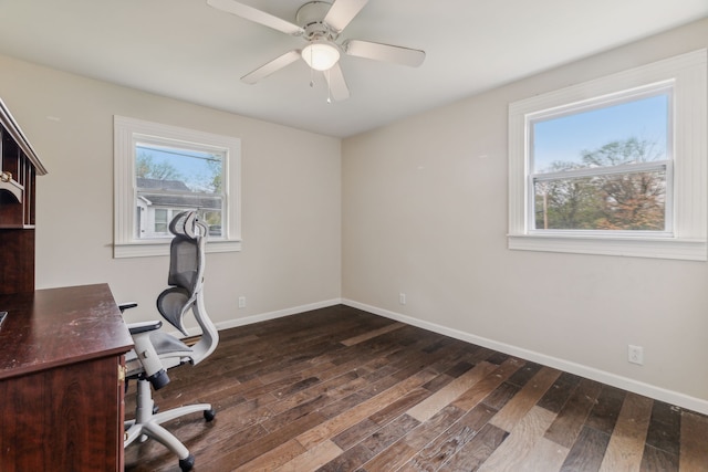 office space with dark wood-type flooring and ceiling fan