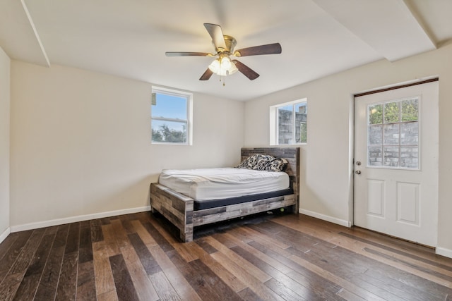 bedroom featuring ceiling fan and dark hardwood / wood-style flooring