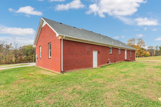 view of property exterior with a yard