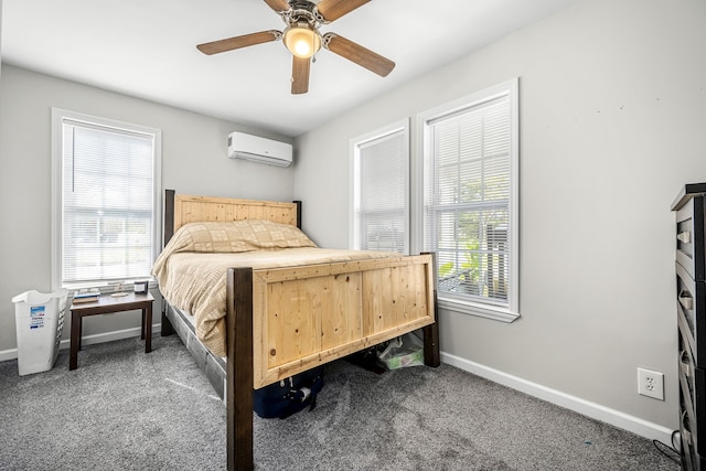 carpeted bedroom with a wall unit AC, multiple windows, and ceiling fan