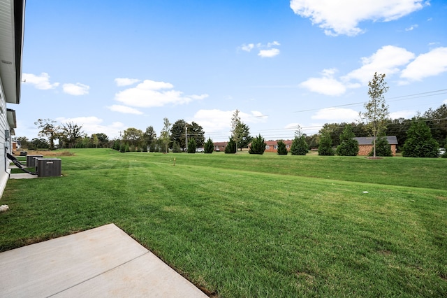 view of yard with central AC