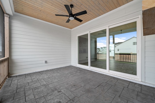 view of patio featuring ceiling fan