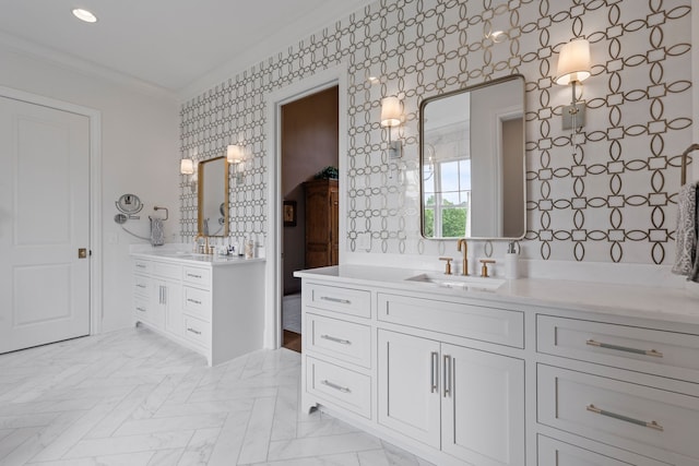 bathroom featuring ornamental molding and vanity