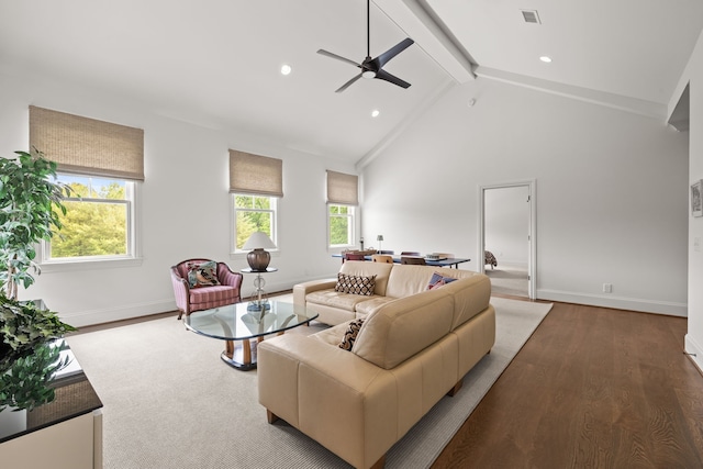 living room featuring high vaulted ceiling, a wealth of natural light, hardwood / wood-style flooring, and ceiling fan