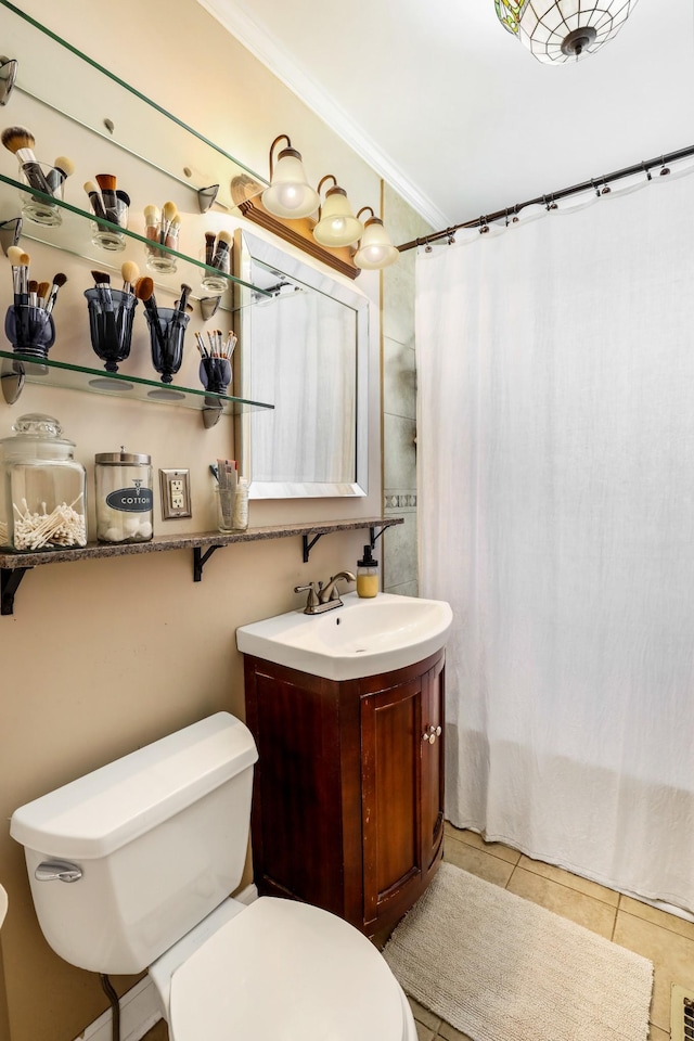 full bathroom with vanity, a shower with curtain, crown molding, tile patterned floors, and toilet