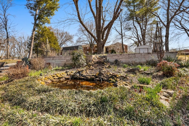view of yard featuring fence