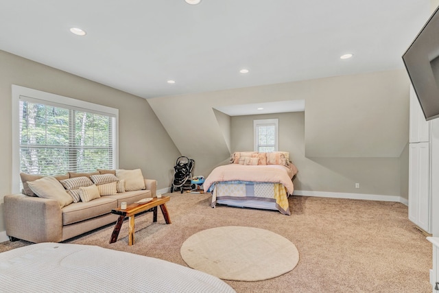 carpeted bedroom featuring vaulted ceiling