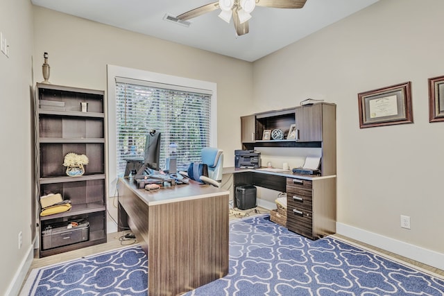 office with ceiling fan and light hardwood / wood-style flooring