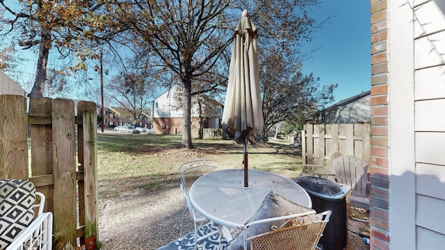 view of yard featuring central AC