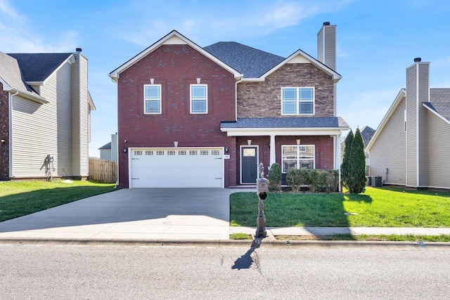 view of front facade with a front yard, a garage, and cooling unit